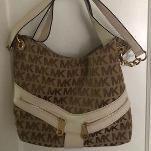 Michael Kors purse and matching wallet. Never worn